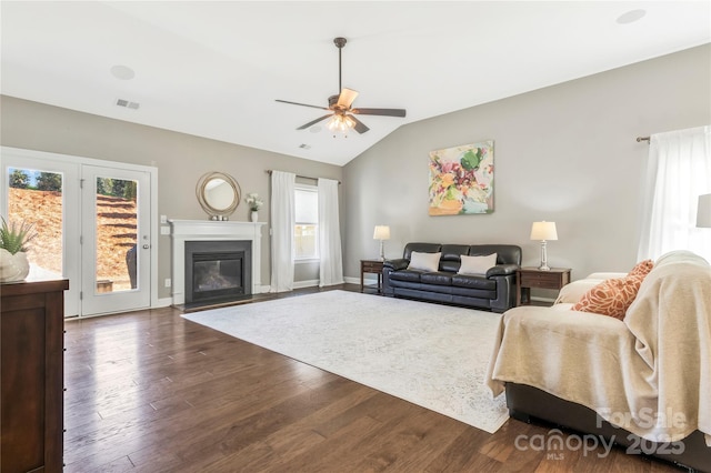 2934 Hiddenbrook Way, Fort Mill, SC 29707 - living room featuring a wealth of natural light, visible vents, vaulted ceiling, and wood finished floors