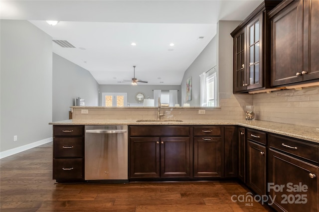2934 Hiddenbrook Way, Fort Mill, SC 29707 - kitchen with visible vents, a sink, stainless steel dishwasher, light stone countertops, and dark brown cabinets