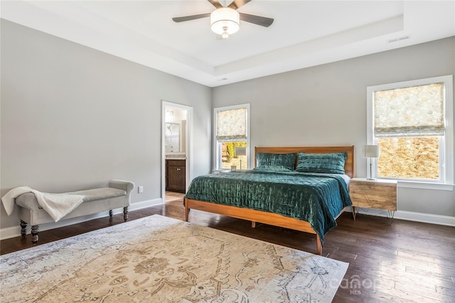 2934 Hiddenbrook Way, Fort Mill, SC 29707 - bedroom with a tray ceiling, baseboards, and wood-type flooring