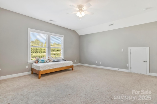 2934 Hiddenbrook Way, Fort Mill, SC 29707 - bedroom featuring light carpet, visible vents, baseboards, and vaulted ceiling