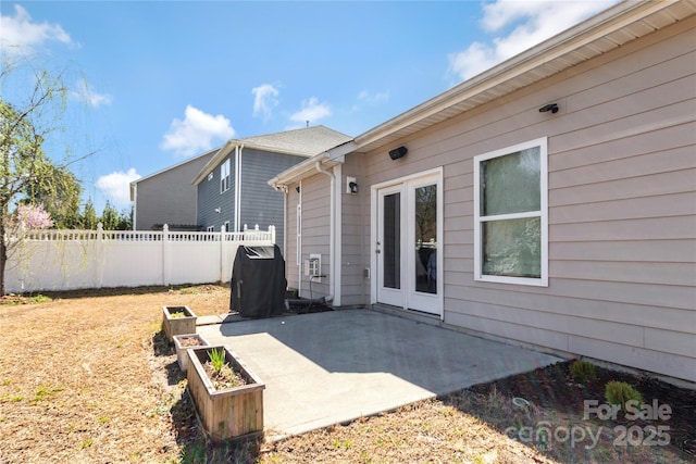 2934 Hiddenbrook Way, Fort Mill, SC 29707 - view of patio featuring a vegetable garden, fence, and grilling area