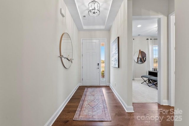 305 Basil Dr, Indian Trail, NC 28079 - entrance foyer featuring dark wood-type flooring and a chandelier