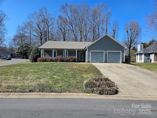 single story home featuring concrete driveway, a front lawn, a porch, and an attached garage