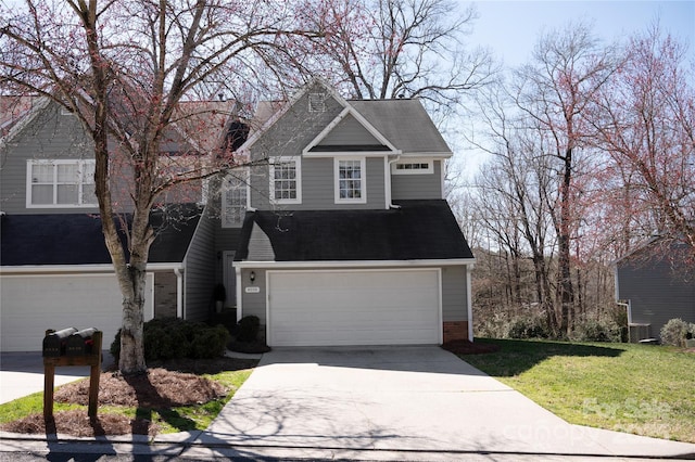 view of front facade with a garage, a shingled roof, a front lawn, and concrete driveway