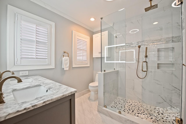 bathroom featuring a stall shower, baseboards, crown molding, and toilet