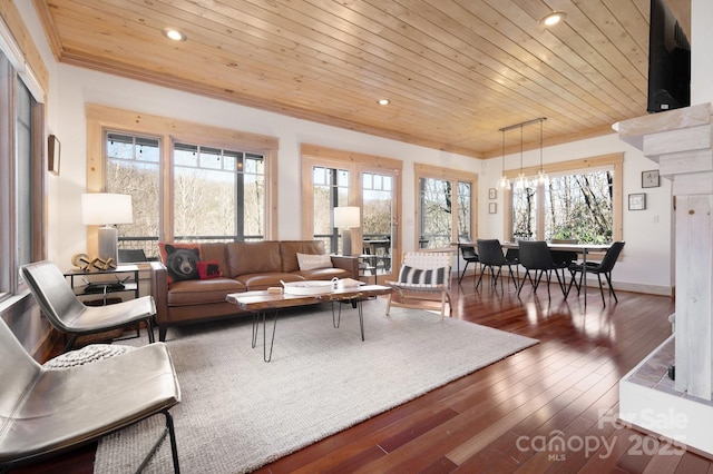 living room with recessed lighting, wood ceiling, crown molding, and hardwood / wood-style floors