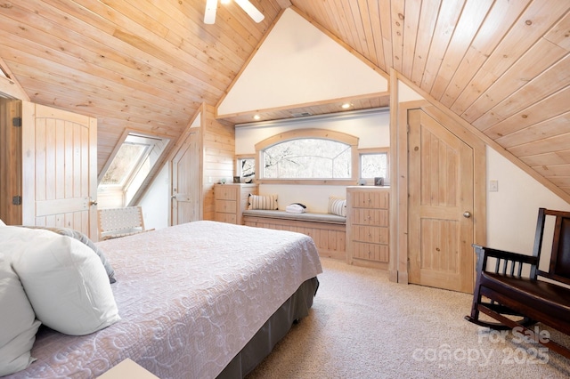 bedroom with lofted ceiling, wooden ceiling, and light carpet