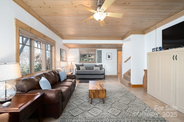 living area with a wealth of natural light, wood ceiling, light tile patterned flooring, and stairway