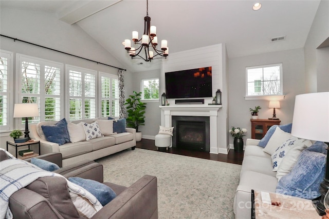 living room featuring visible vents, baseboards, vaulted ceiling with beams, a fireplace, and dark wood-style flooring