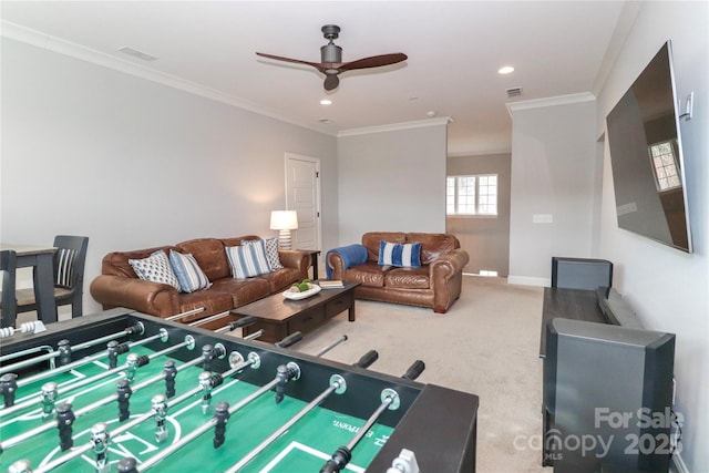 playroom featuring visible vents, carpet flooring, crown molding, and baseboards