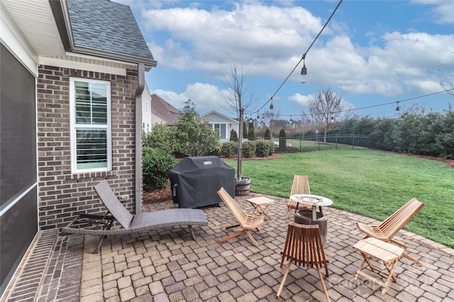 view of patio / terrace featuring grilling area and fence