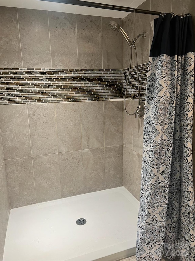 full bathroom with a stall shower