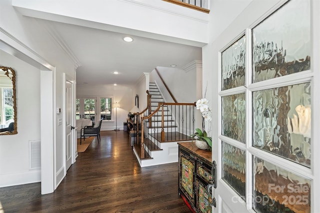 foyer entrance with recessed lighting, visible vents, stairway, dark wood-style floors, and crown molding