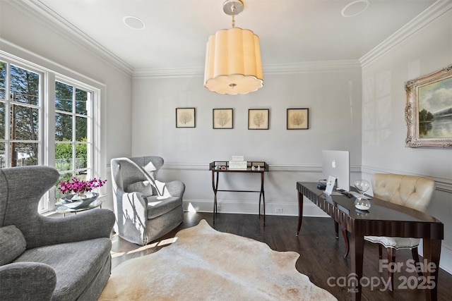 sitting room with crown molding, baseboards, and wood finished floors