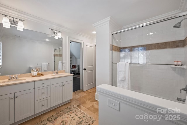 bathroom with ornamental molding, a shower with door, a sink, and double vanity