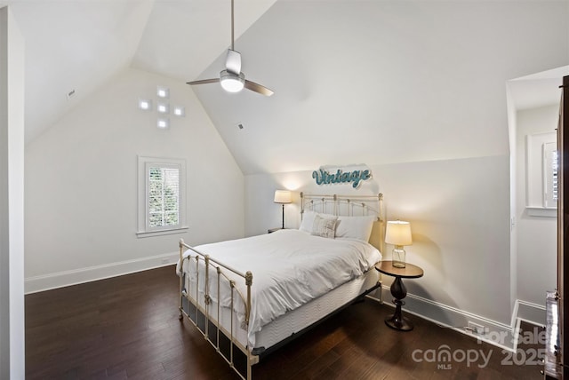 bedroom featuring lofted ceiling, wood-type flooring, baseboards, and ceiling fan