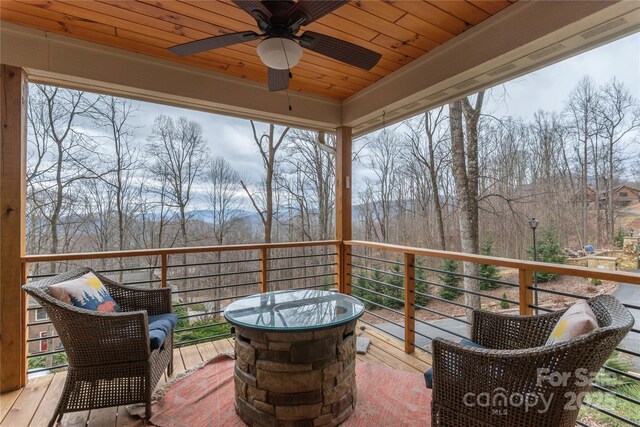 wooden terrace with ceiling fan