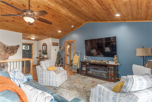 living area with lofted ceiling, wooden ceiling, recessed lighting, wood finished floors, and a ceiling fan