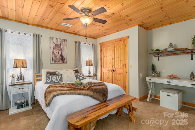 carpeted bedroom with ceiling fan, wooden ceiling, visible vents, and baseboards