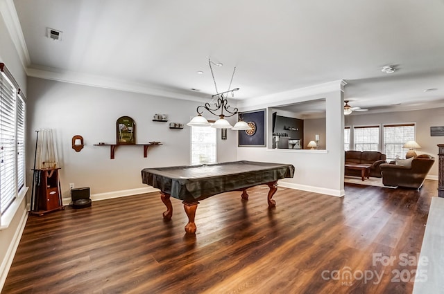 game room featuring baseboards, visible vents, wood finished floors, and ornamental molding