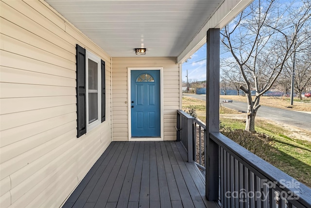 wooden deck with a porch