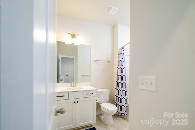 bathroom with a shower with shower curtain, visible vents, vanity, and toilet