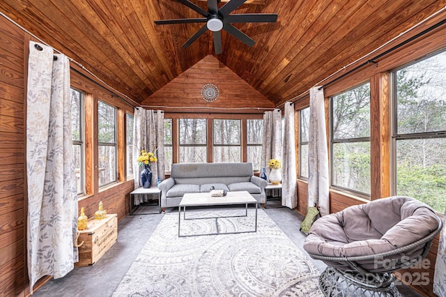 sunroom / solarium featuring lofted ceiling, wood ceiling, and ceiling fan