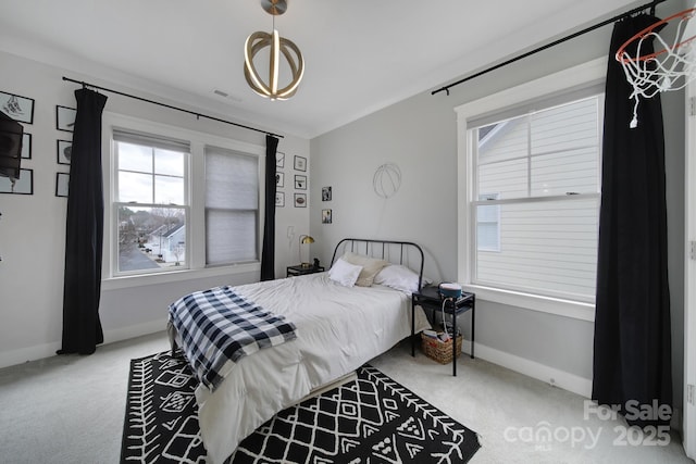 bedroom featuring carpet, visible vents, and baseboards