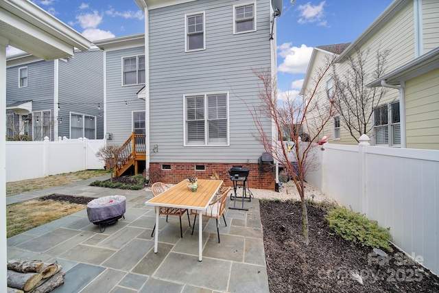 view of patio / terrace featuring a fenced backyard and outdoor dining space