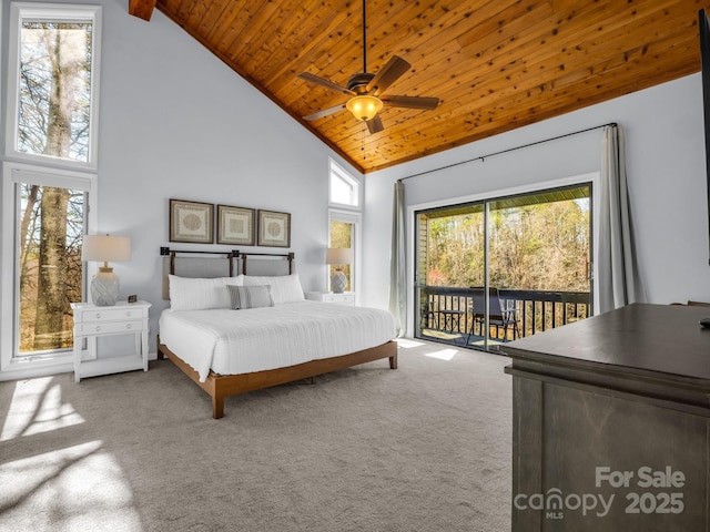 carpeted bedroom with wooden ceiling, access to outside, a ceiling fan, and high vaulted ceiling