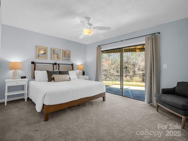 carpeted bedroom with a textured ceiling, a ceiling fan, and access to outside