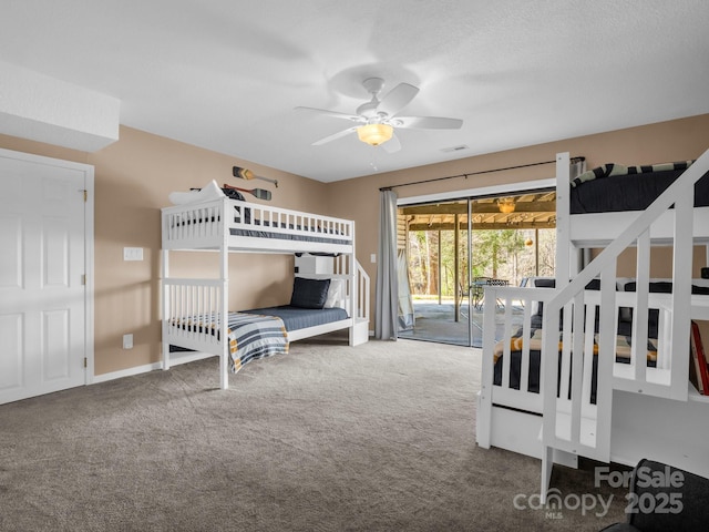 bedroom featuring access to exterior, carpet, visible vents, and baseboards