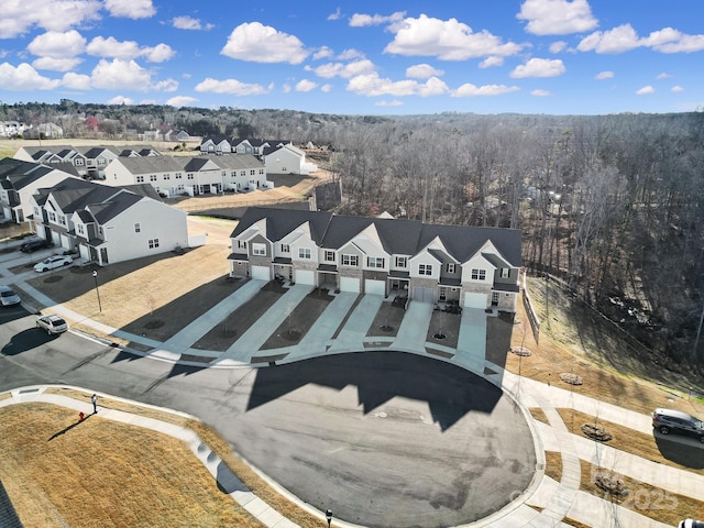 birds eye view of property with a residential view