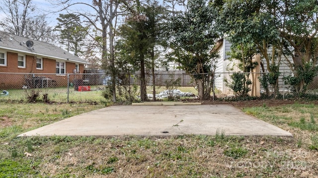 view of patio / terrace featuring fence