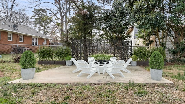 view of patio featuring fence