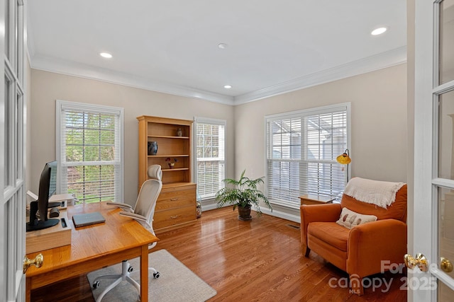 office space with recessed lighting, visible vents, ornamental molding, and wood finished floors