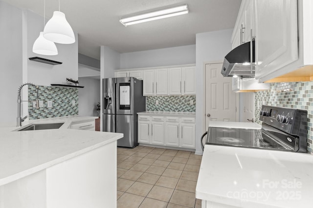 kitchen with black electric range oven, under cabinet range hood, a sink, stainless steel fridge, and white cabinets