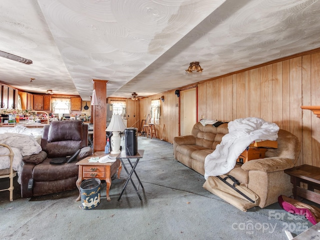 living area with wooden walls