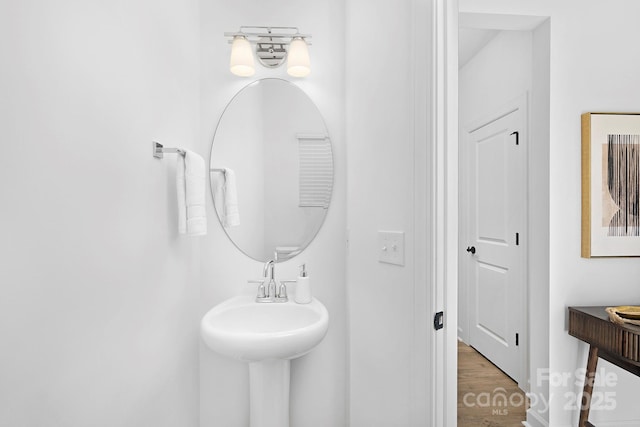 bathroom featuring wood finished floors