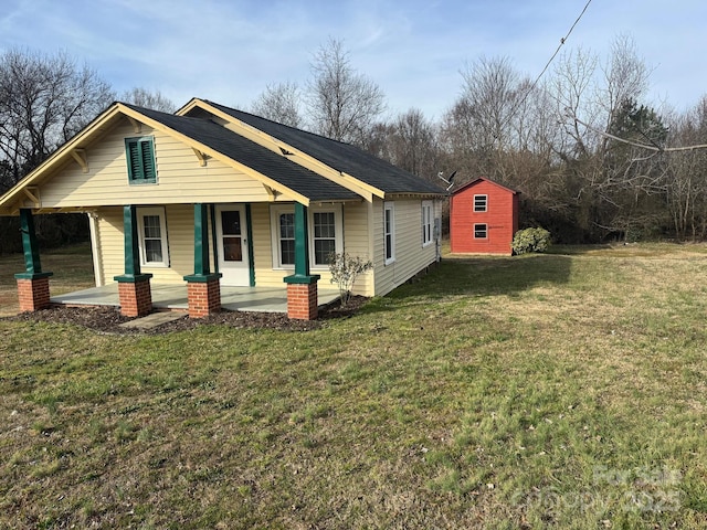 view of front facade with a porch and a front yard