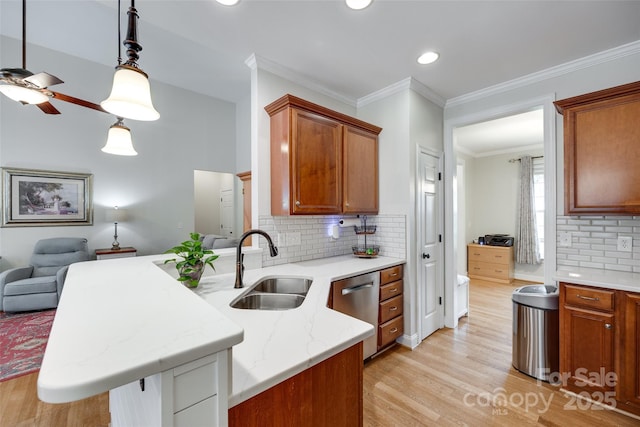 2050 Sunswept Ln, York, SC 29745 - kitchen with a sink, dishwasher, light wood-type flooring, a peninsula, and a ceiling fan