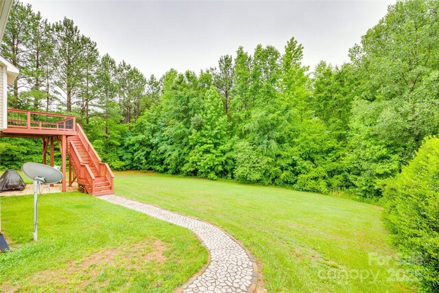 2050 Sunswept Ln, York, SC 29745 - view of green lawn with stairway and a deck