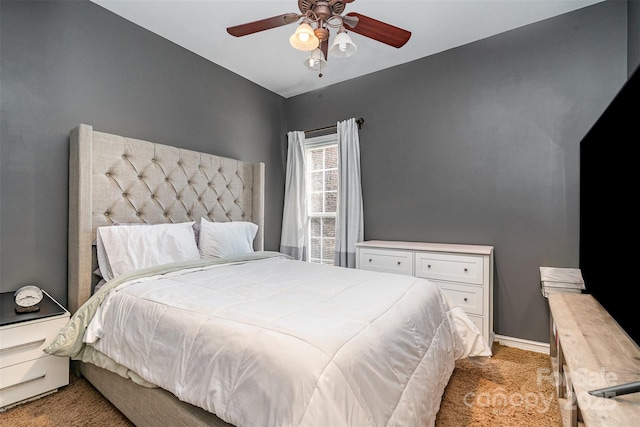 bedroom featuring carpet flooring, baseboards, and ceiling fan