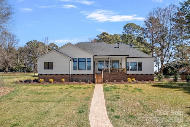 view of front of home featuring a porch, crawl space, a front yard, and fence