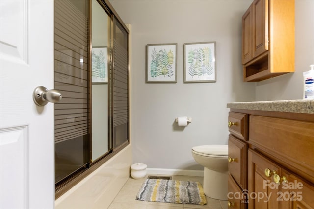 full bath with toilet, a shower with door, tile patterned flooring, baseboards, and vanity