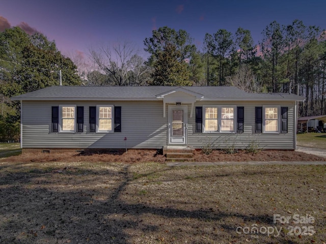 view of front of home featuring crawl space