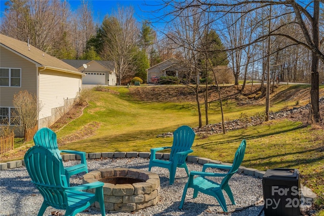 view of yard with an outdoor fire pit