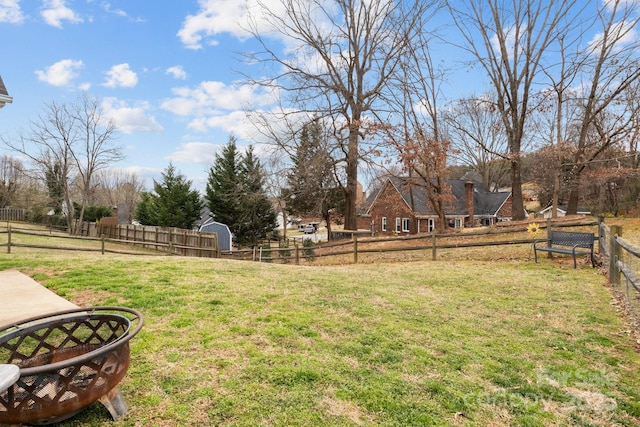 view of yard with fence