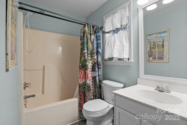 full bath featuring shower / bath combo, vanity, and toilet