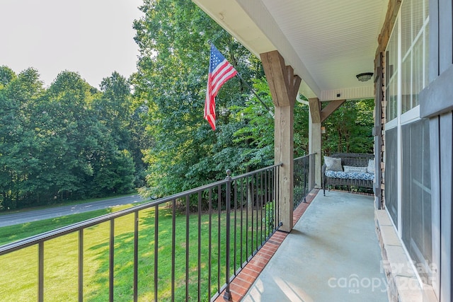 balcony featuring a porch